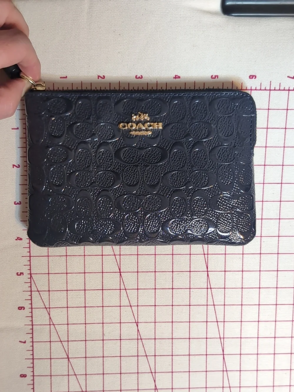 COACH Navy Blue Signature Embossed Leather Zip Wristlet with Gold Logo